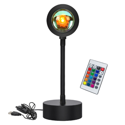 Black adjustable Melted Sun sunset projector lamp with colorful remote control on a white background