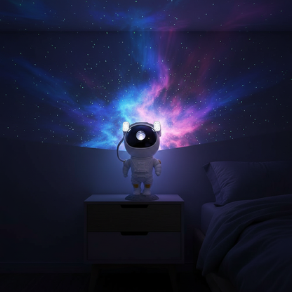 SpaceBuddy Astronaut Galaxy Projector night light projecting a colorful nebula on a dark wall in a bedroom.